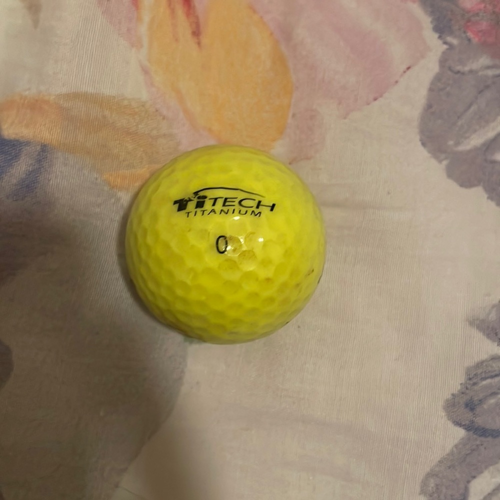 3/$3 Yellow golf ball